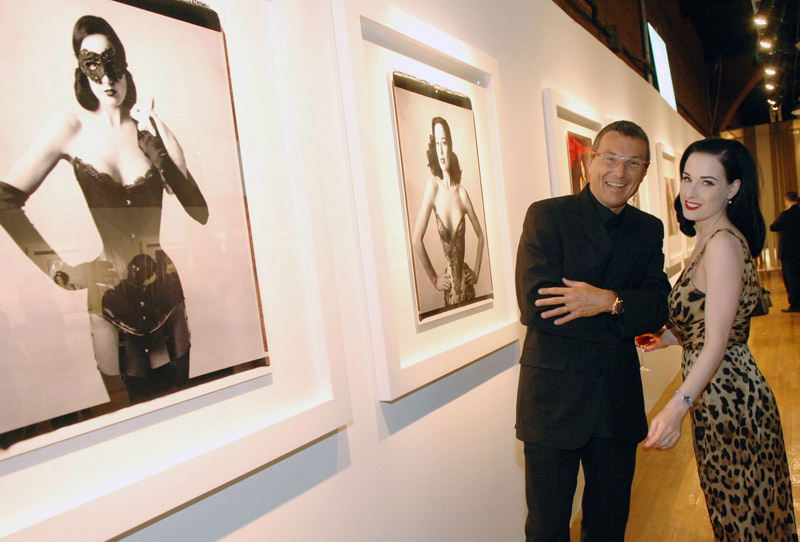 TAG Heuer President and CEO Jean-Christophe Babin & Dita Von Teese at the exhibition gallery.