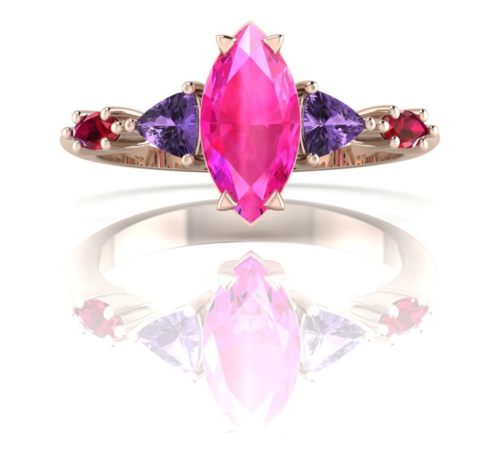 Maisie Marquise - Shades of Pink.
Elegant, modern and sophisticated with a splash of colourful fun this 5 stone engagement ring is truly exquisite. Comprising of a marquise cut central pink sapphire, violet trillion sapphires and marquise shaped rubies set side by side to create a magical engagement ring.