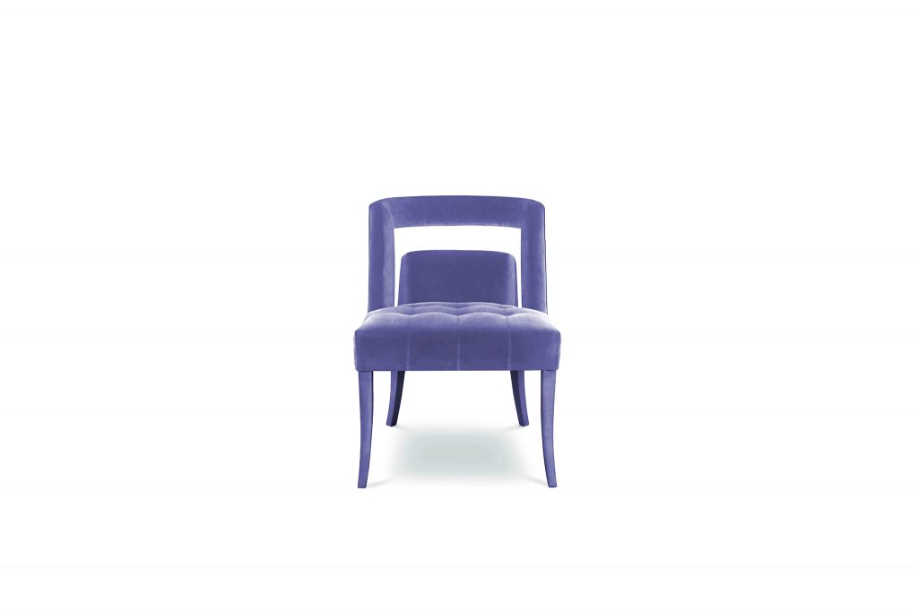 Naj Dining Chair: A dining room chair fully upholstered in velvet with nickeled nails. This velvet upholstered dining chair is sure to make a statement.