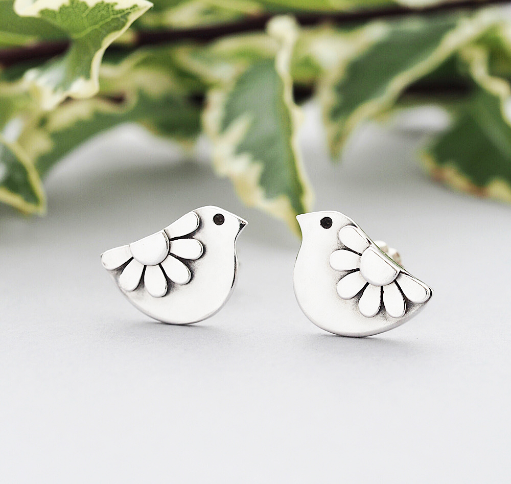 Sterling Silver Folk Art Daisy Bird Stud Earrings

These super cute sterling silver daisy flower bird stud earrings have been designed and made completely from scratch and entirely by hand using traditional silversmithing techniques Fee's Sussex workshop.