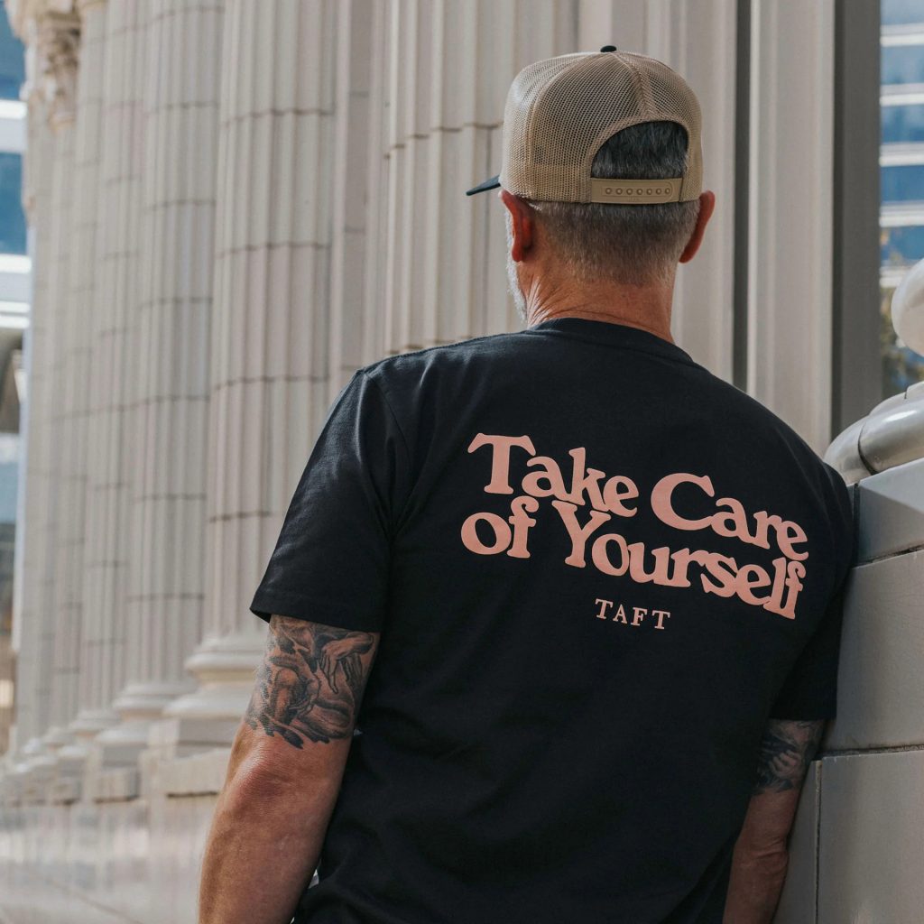 TAFT - Take Care T-Shirt in Coal and Salud Mental Hat in Navy/Khaki.