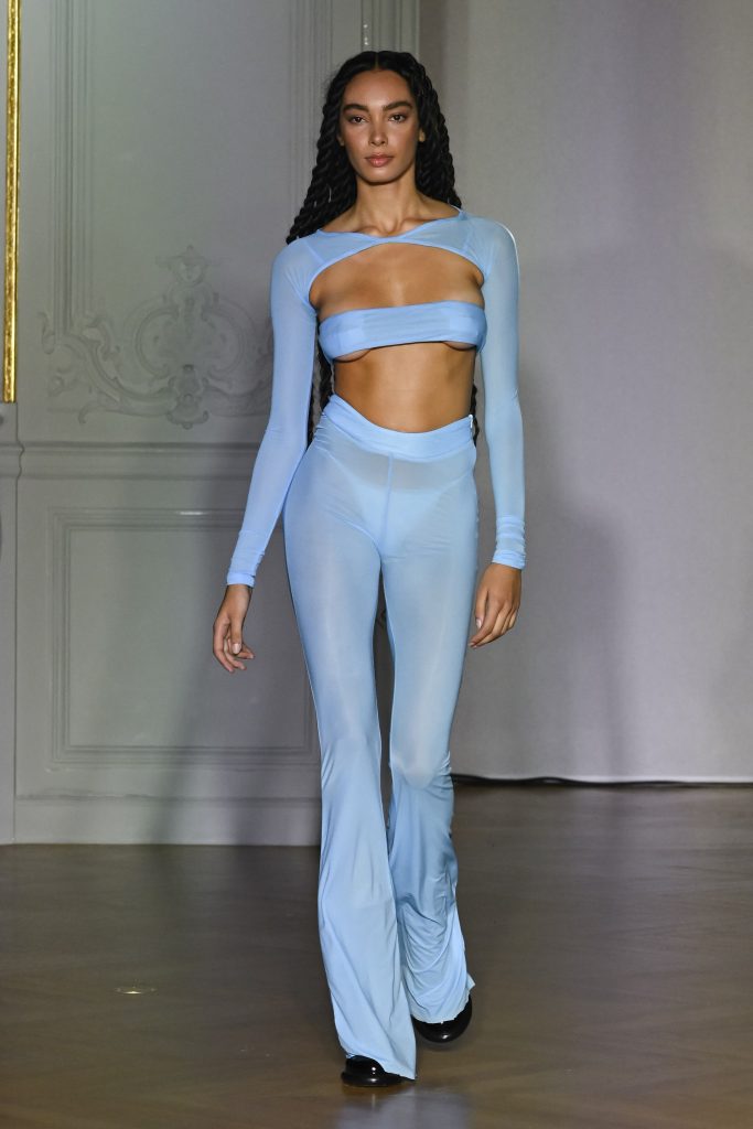 A model wearing an original creation from the THEUNISSEN Spring/Summer 2024 Womenswear Collection in Paris from the house of Arianne Theunissen.
