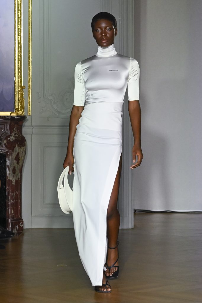 A model wearing an original creation from the THEUNISSEN Spring/Summer 2024 Womenswear Collection in Paris from the house of Arianne Theunissen.