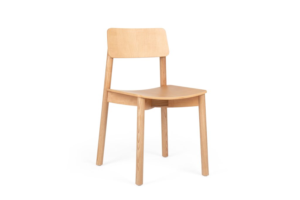 In all this Mine Collection, four round solid wooden legs are connected by a cross lap joint. The seat and back panel consist of identical plywood shells that are CNC cut to size. The legs are slightly inclined towards the seat and back. This conical shape not only harmonises the furniture visually, but also makes it stable in use. The pure, rational structure turns this chair into an archetype, which acquires its uniqueness through its well-thought-out programme, balanced proportions and sophisticated curves.