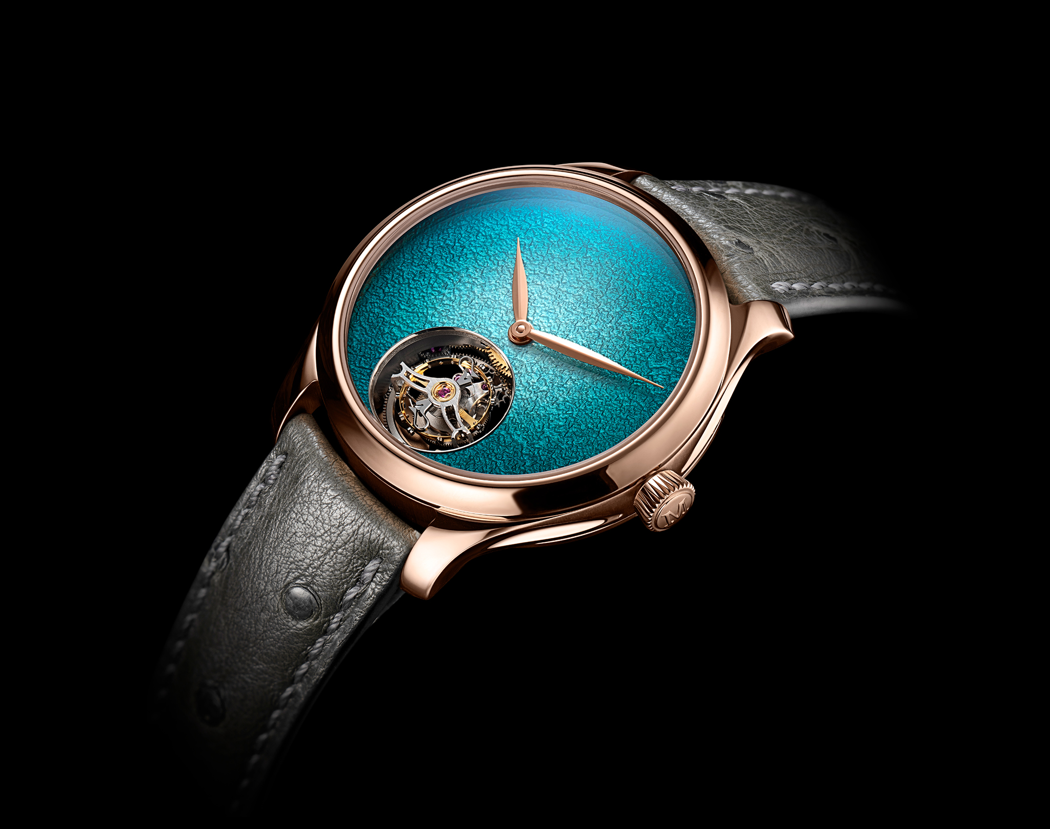 The Endeavour Tourbillon Concept Turquoise Enamel by H. Moser & Cie., reference 1805-0400, 5N red gold model, Turquoise fumé dial, grey ostrich leather strap.