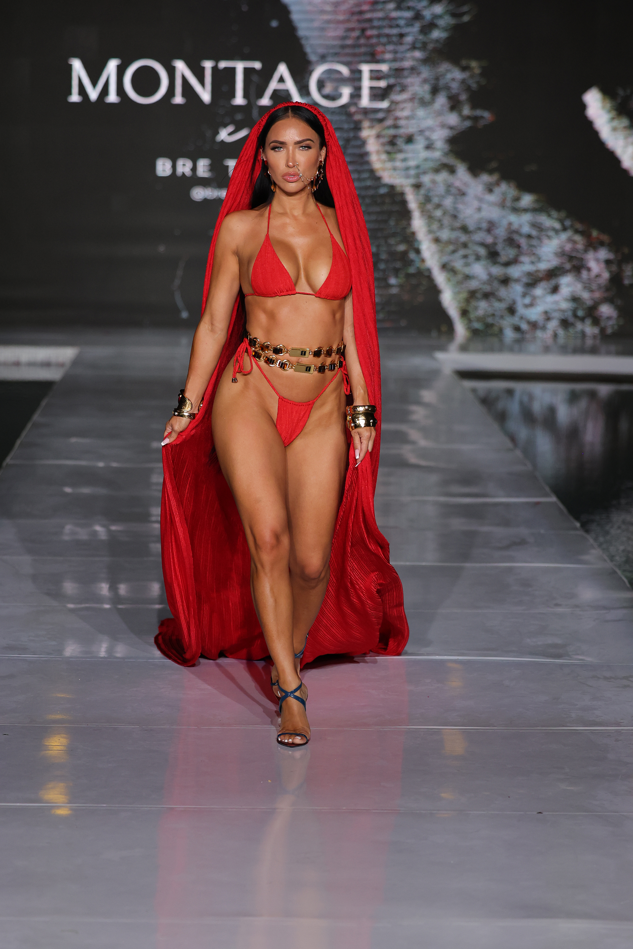 MIAMI BEACH, FLORIDA - MAY 29: A model walks the runway wearing Montage Swimwear during Miami Swim Week: The Shows on May 29, 2025 in Miami Beach, Florida. (Photo by Thomas Concordia/Getty Images for Miami Swim Week: The Shows)