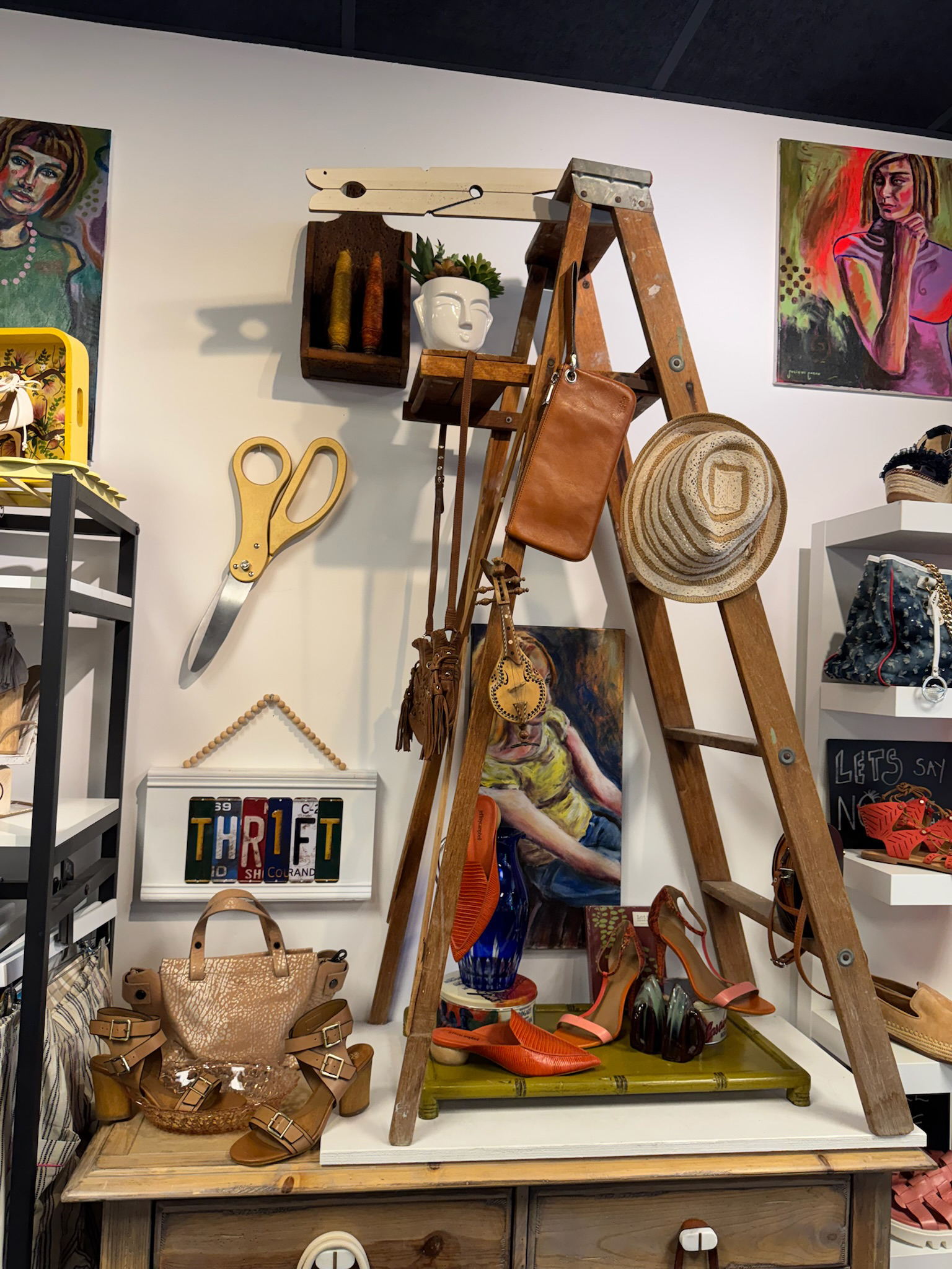 A vintage ladder transformed into a visual centerpiece, highlighting Project ReWear’s commitment to creative reuse and curated secondhand finds.
Photo courtesy of Project ReWear