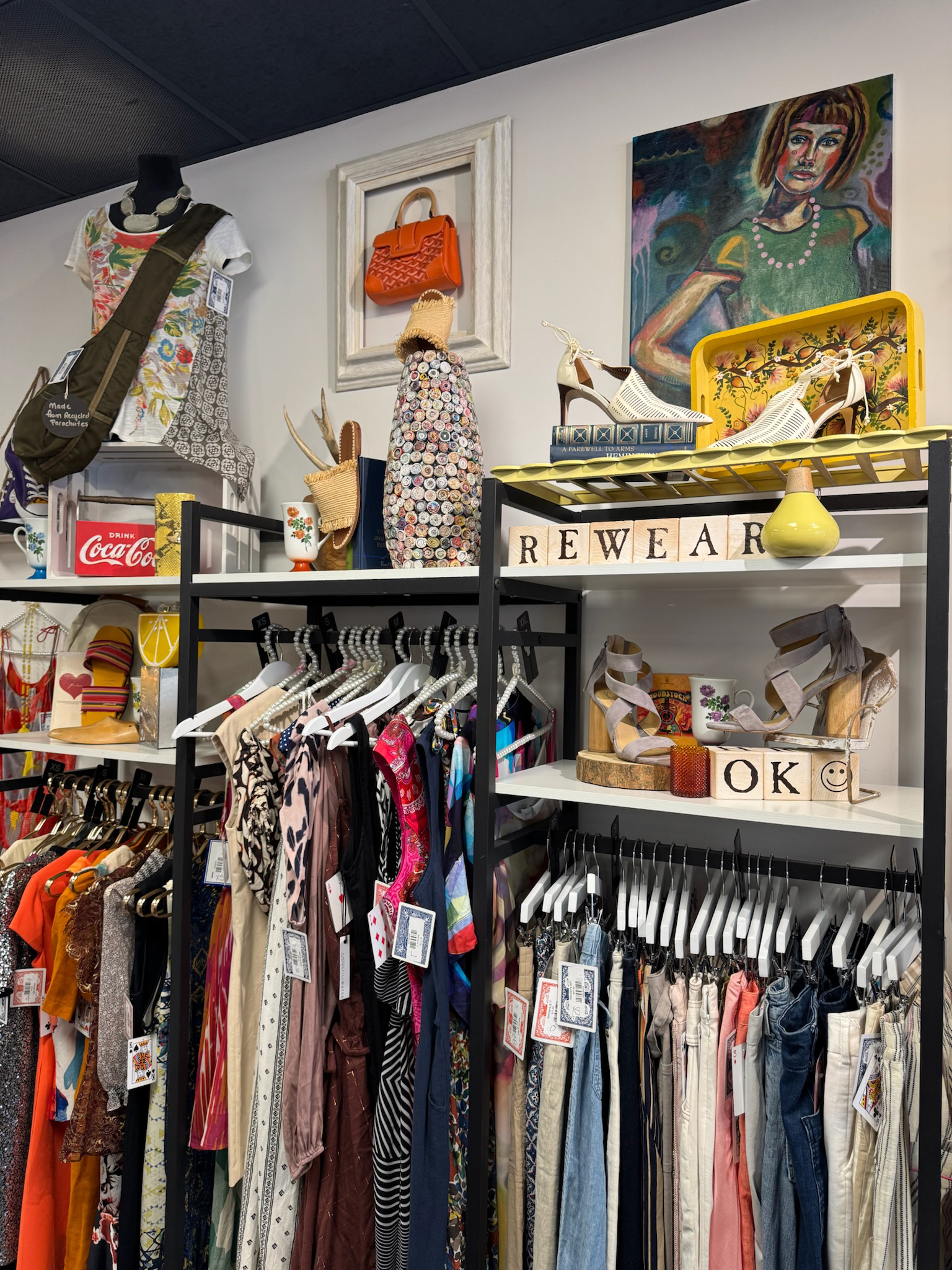 Colorful racks and accessories capture the brand's joyful approach to preloved fashion, with playful details woven throughout the space. Photo courtesy of Project ReWear