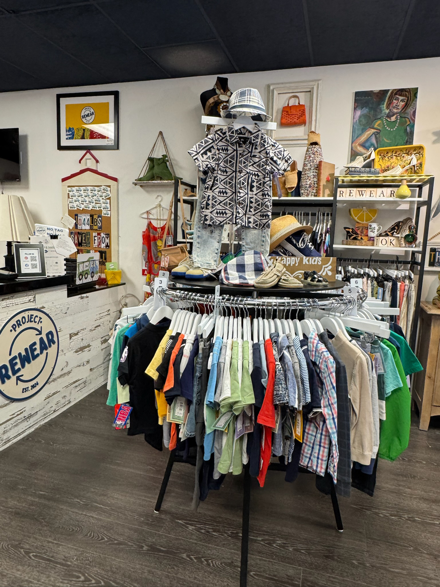 Project ReWear’s kids’ section features an ever-changing selection of pre-loved clothing and accessories, styled to feel fresh, fun, and accessible. Photo courtesy of Project ReWear.