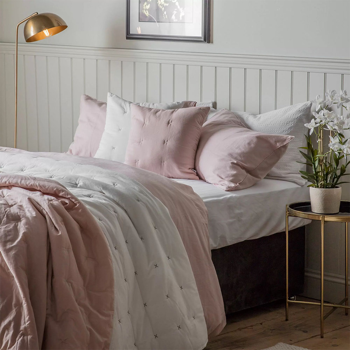Faye Cotton Bedspread - Blush Pink
Adorn your bedroom with the delicate freshness of the Faye Bedspread. The reversible blush and white cotton is embellished with cross-stitched details for an elegant finish.