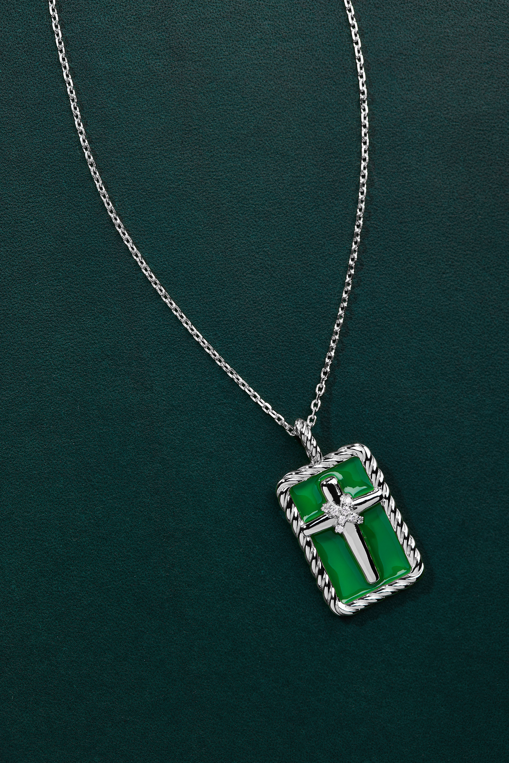 Rooted, Cross Pendant in 18k Gold with Partial Diamonds in Sterling Silver
Photography by Ben Pigao, courtesy of Bible Club