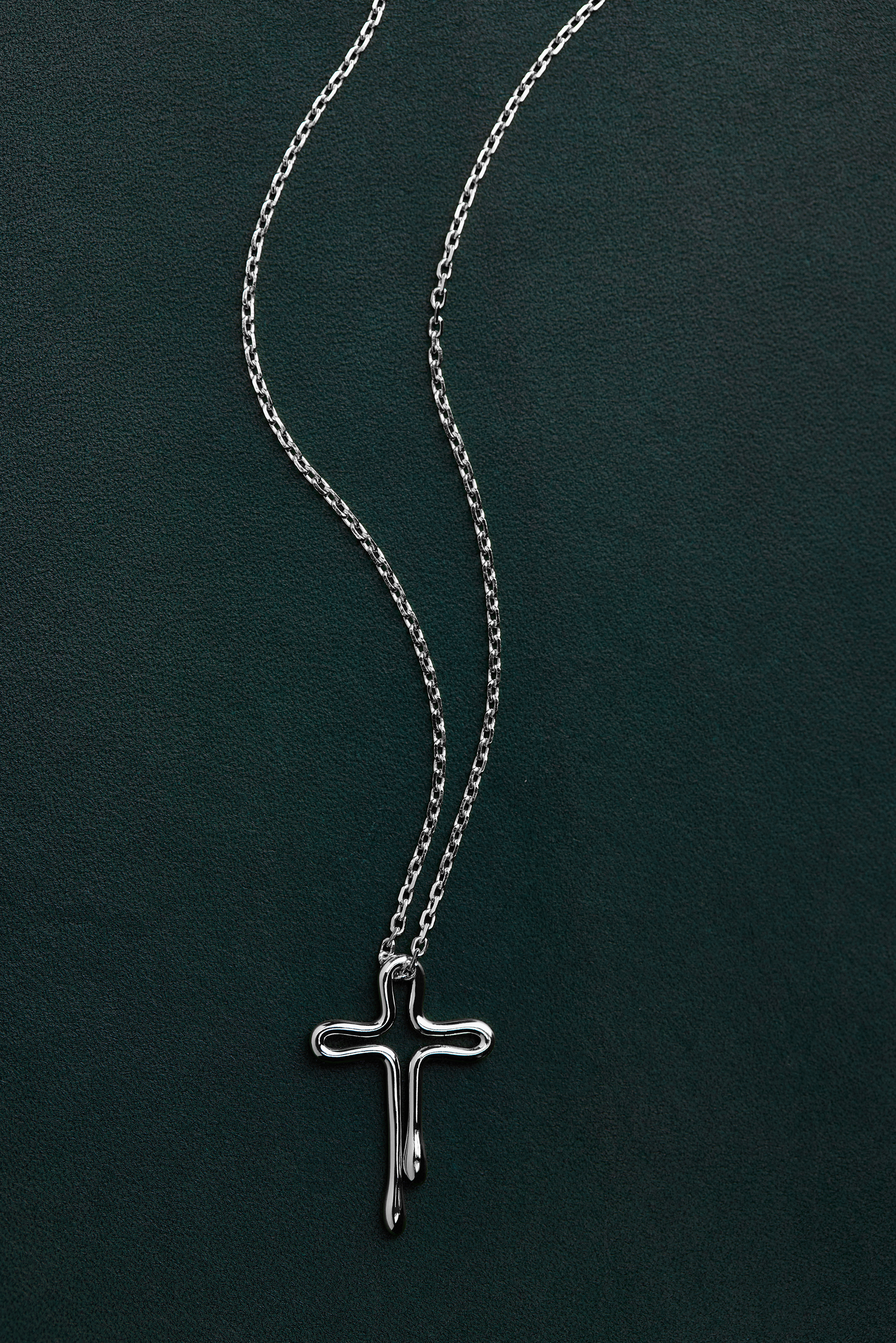 Tear Drops, Cross Pendant in Sterling Silver
Photography by Ben Pigao, courtesy of Bible Club