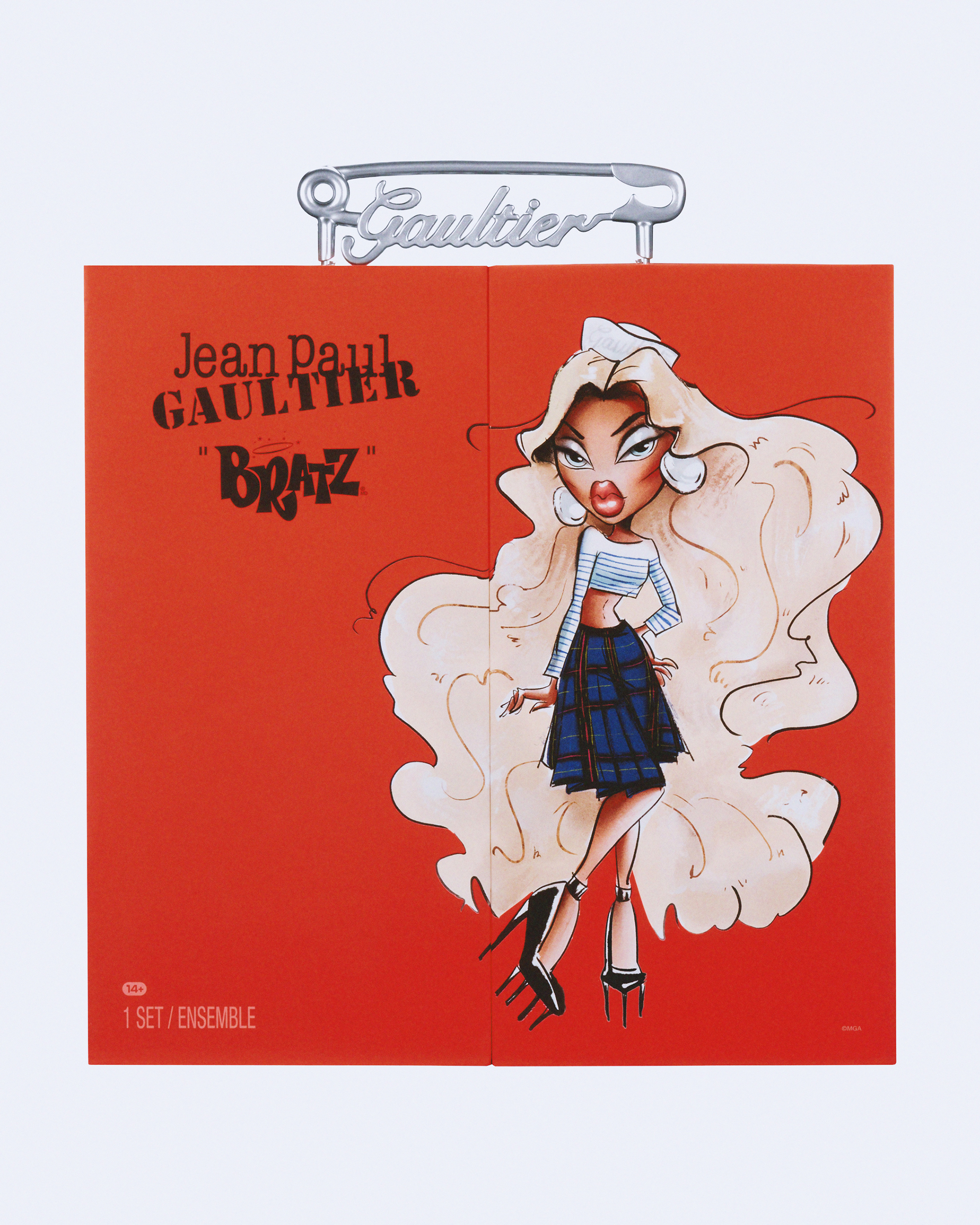 Bratz® x Jean Paul Gaultier Collector Doll - Package
A standout luxury collectible, the The Bratz x Jean Paul Gaultier Collector Doll includes two outfits, fun accessories - like a mini Bratz x Gaultier fashion magazine and Gaultier fragrance bottle - along with custom packaging featuring a branded "Gaultier" safety pin handle and a surprise fold-out display.