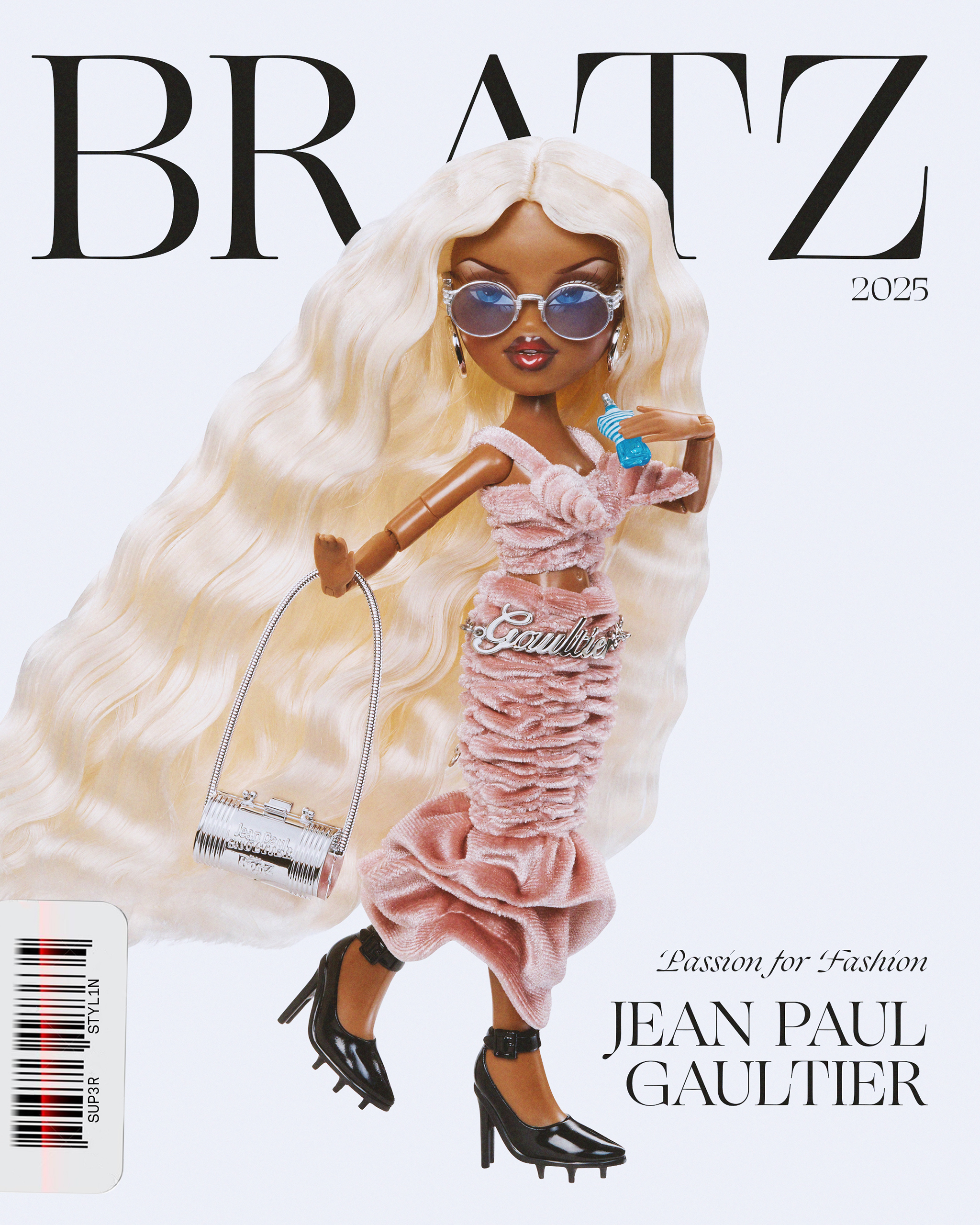 Bratz® x Jean Paul Gaultier Collector Doll - Pink Dress
Fearless fashion meets Parisian couture in this ultra-premium doll. Sasha is dripping in Gaultier DNA, serving two high concept looks that marry avant-garde elegance with signature bratitude. A true homage to Jean Paul Gaultier's couture heritage, she commands the spotlight in a sculptural pink velvet bustier dress, revisiting a legendary silhouette from the House's archives, and a metallic "Gaultier" chain belt. Black patent cleated heels bring the drama from head to toe.