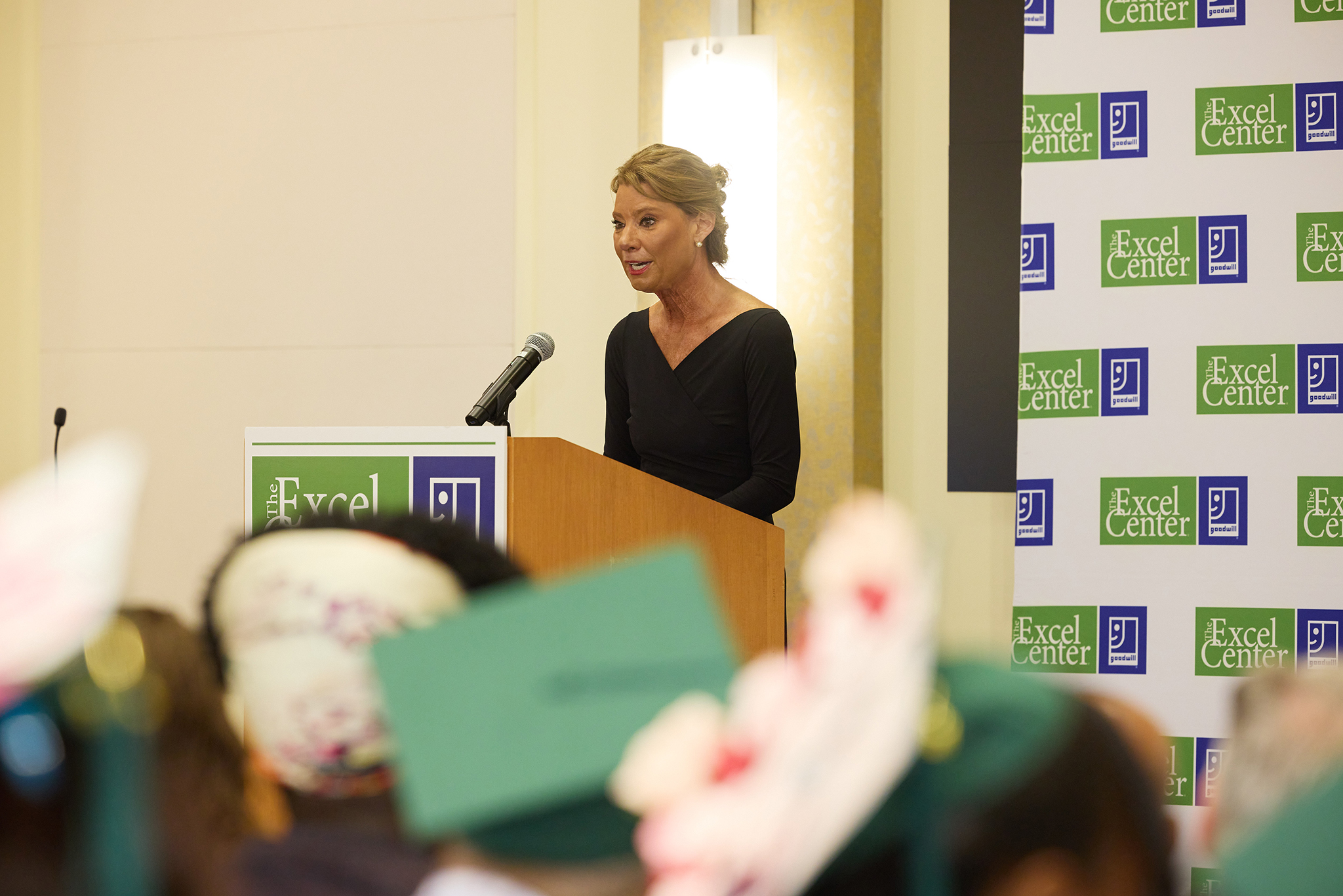 Lisa RUSYNIAK President & CEO, Goodwill Industries of the Chesapeake speaking at the Goodwill Industries- Excel Center Graduation Ceremony. (Photo courtesy of Goodwill Industries of the Chesapeake)