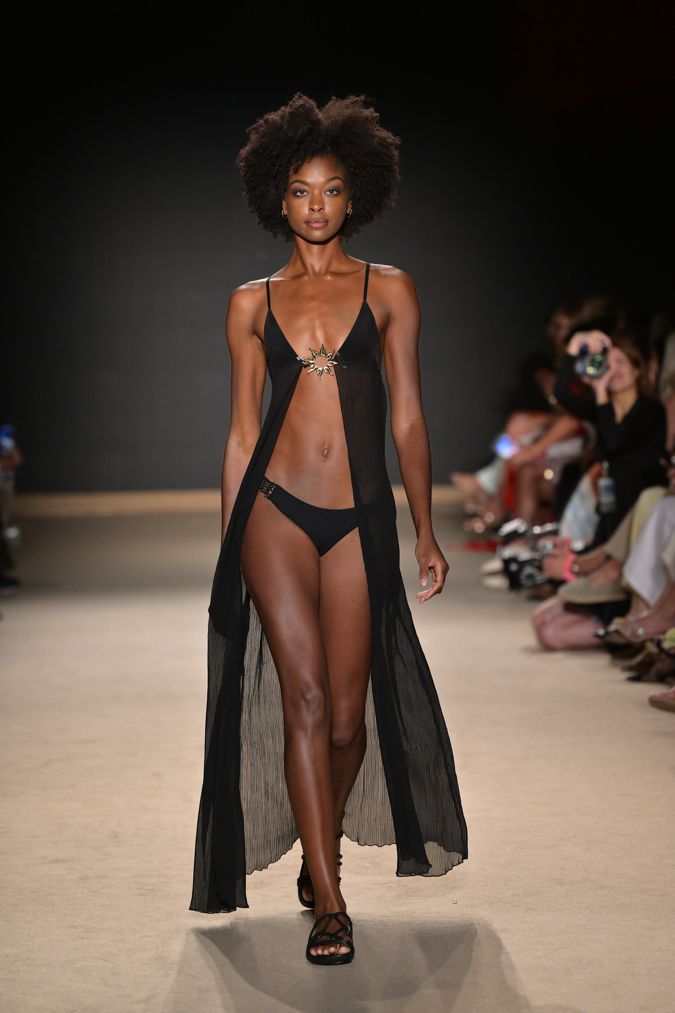 A model walks down the runway at the Leslie Amon Fashion Show.