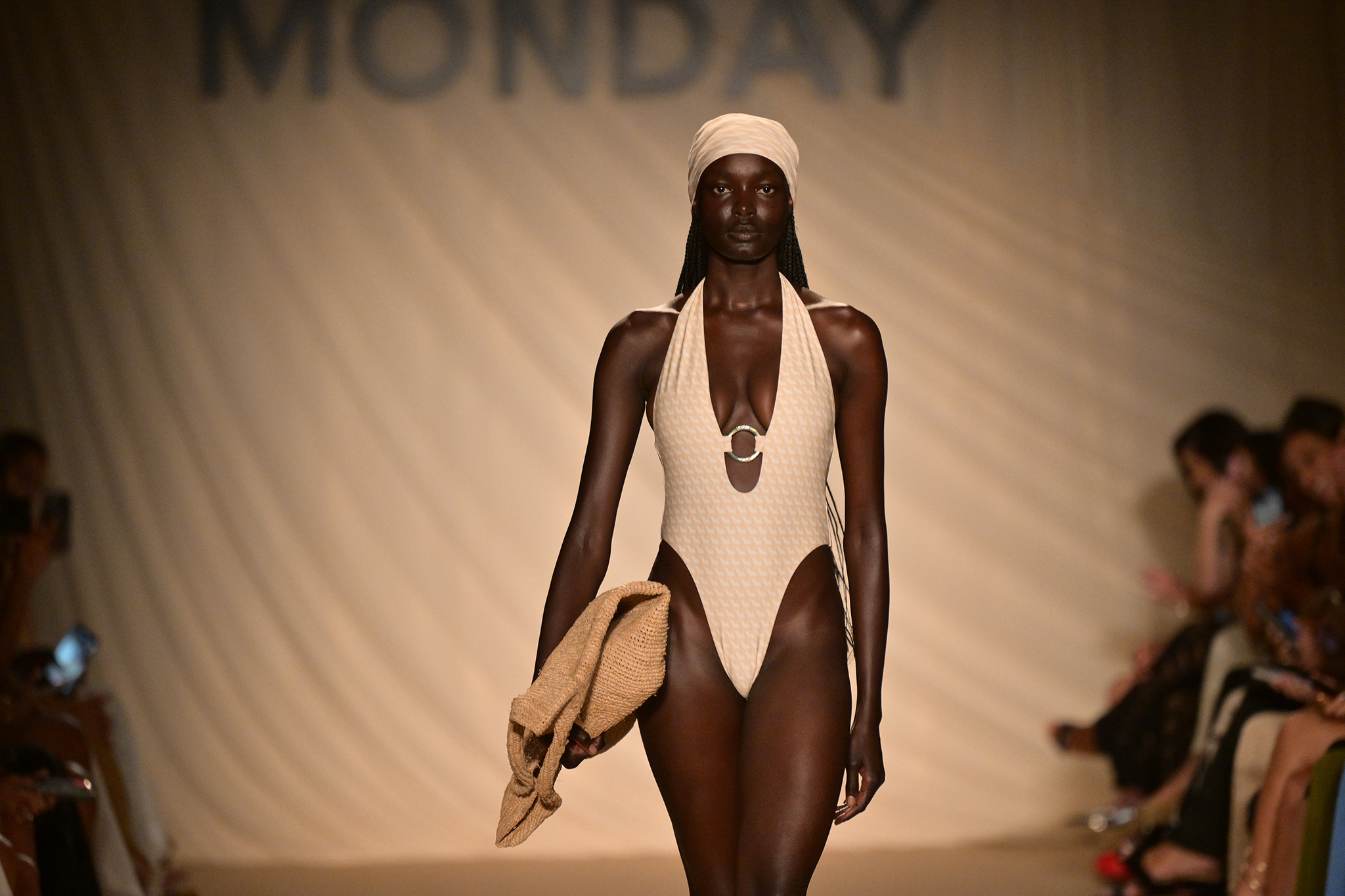 A model walks down the runway at the MONDAY SWIM Fashion Show.