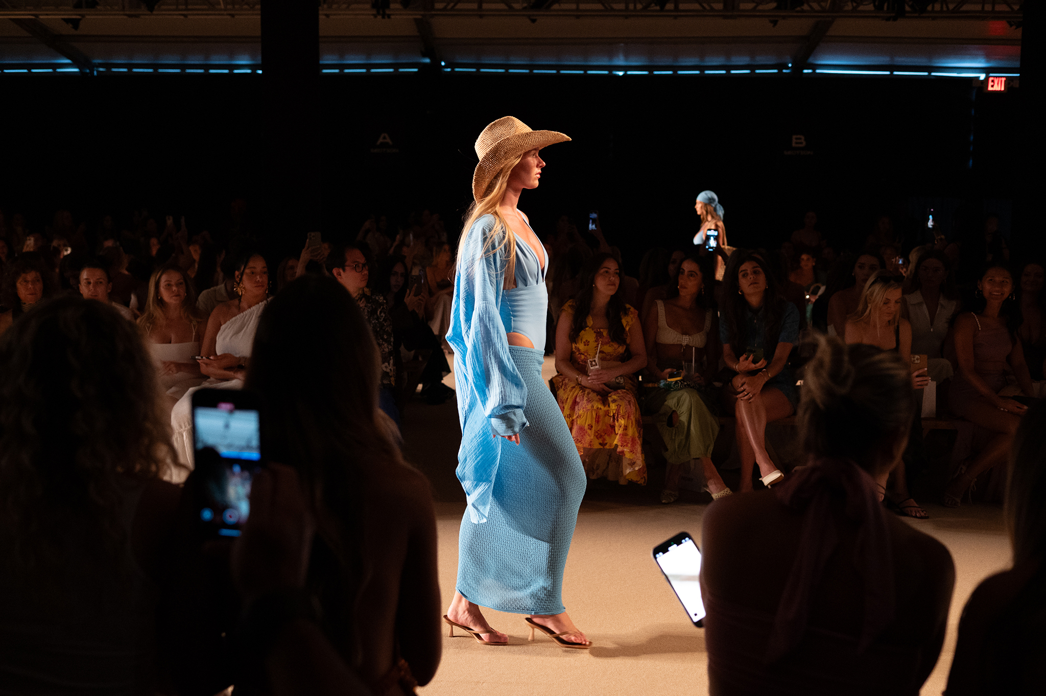 A model walks down the runway at the MONDAY SWIM Fashion Show.