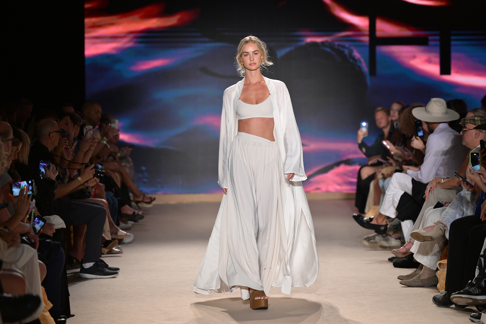 A model walks down the runway at the SHAN Fashion Show.