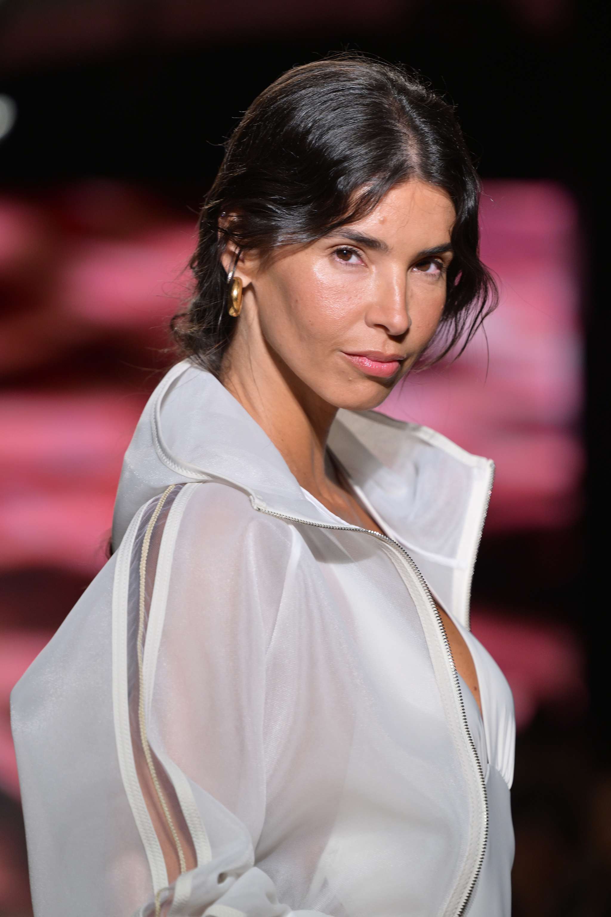 A model walks down the runway at the SHAN Fashion Show.