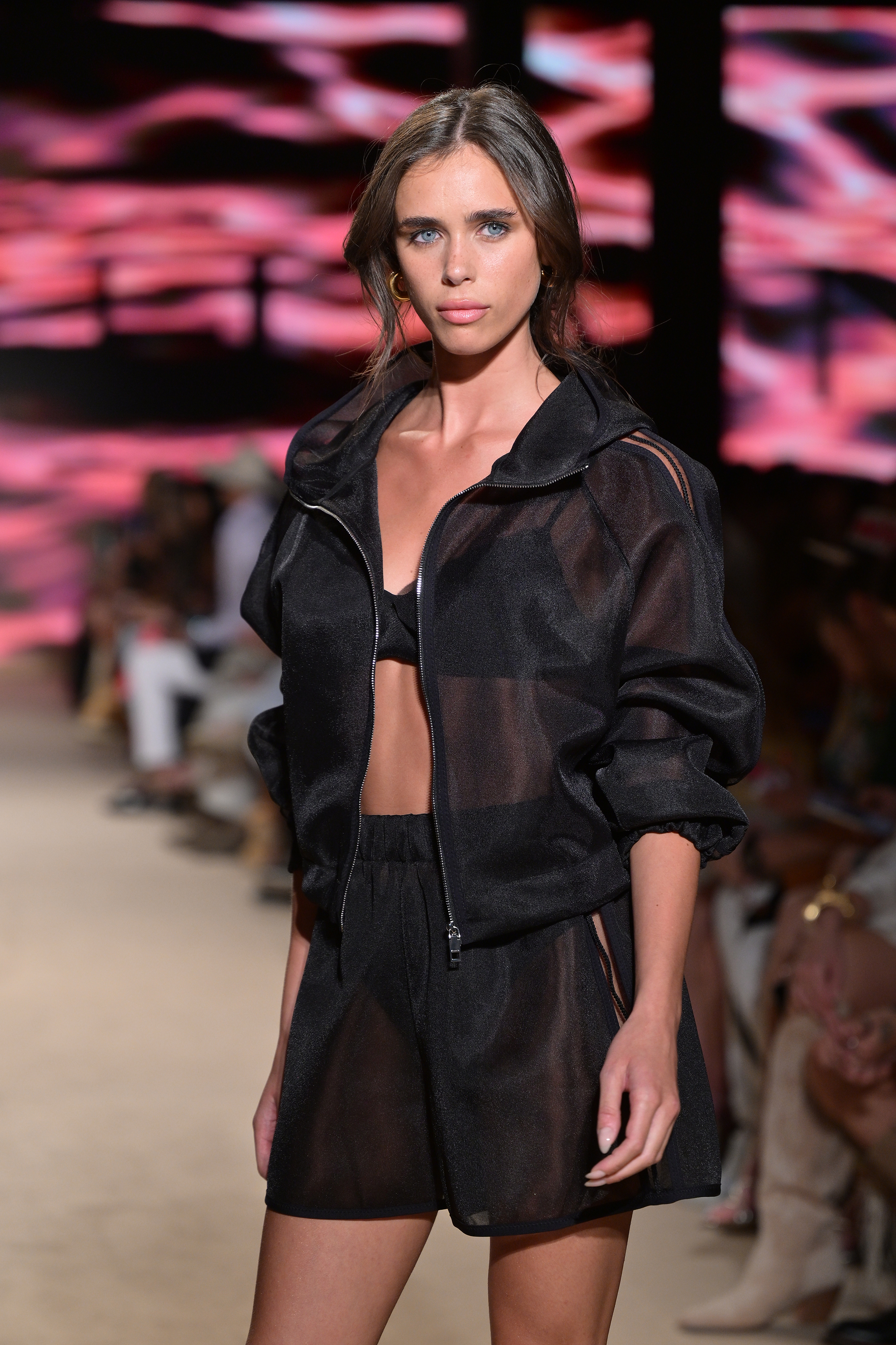A model walks down the runway at the SHAN Fashion Show.