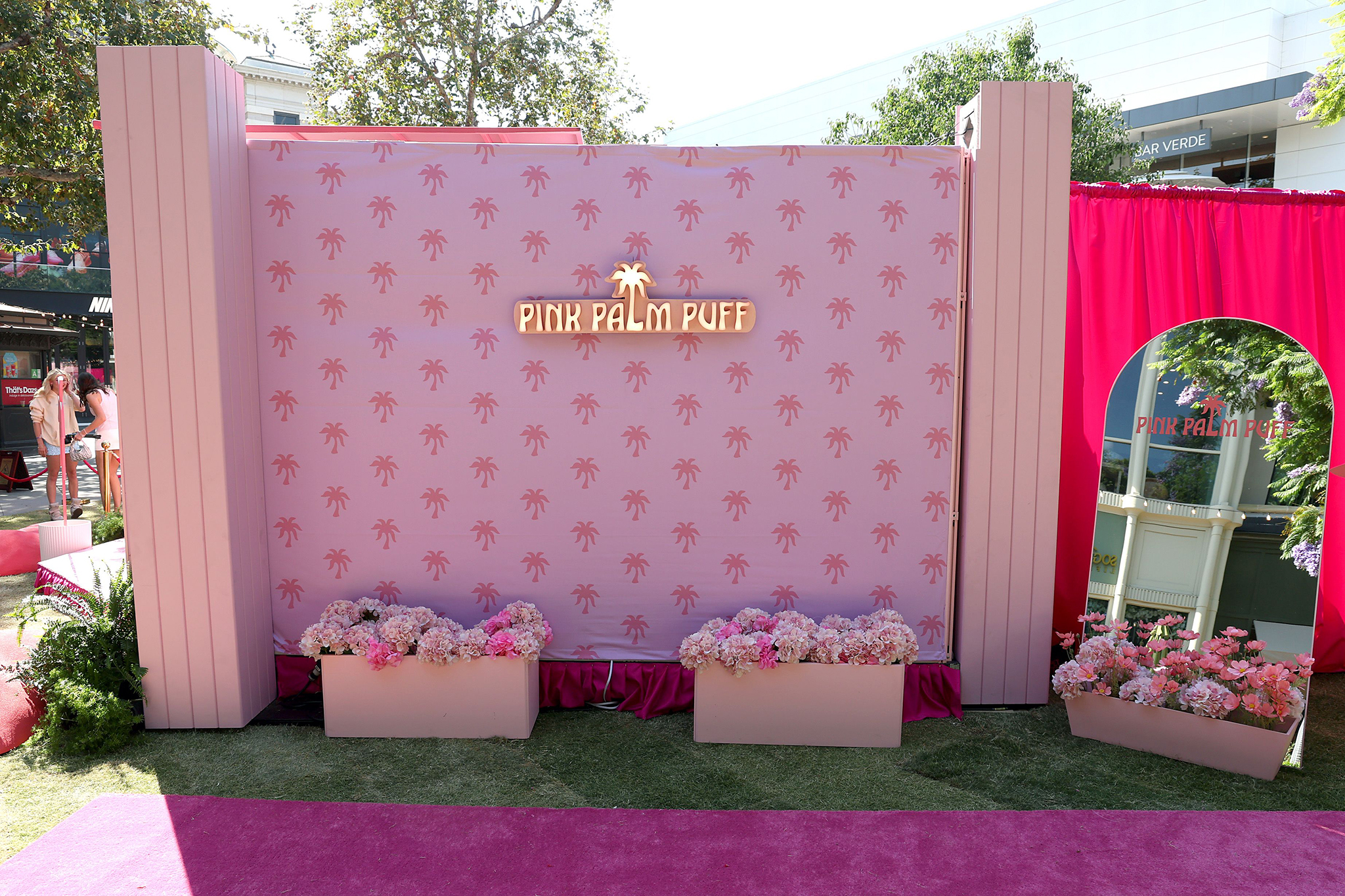 LOS ANGELES, CALIFORNIA - AUGUST 08: Pink Palm Puff activation is seen during the Pink Palm Puff VIP Pop-Up Event at The Grove on August 08, 2025 in Los Angeles, California. (Photo by Phillip Faraone/Getty Images for Pink Palm Puff)