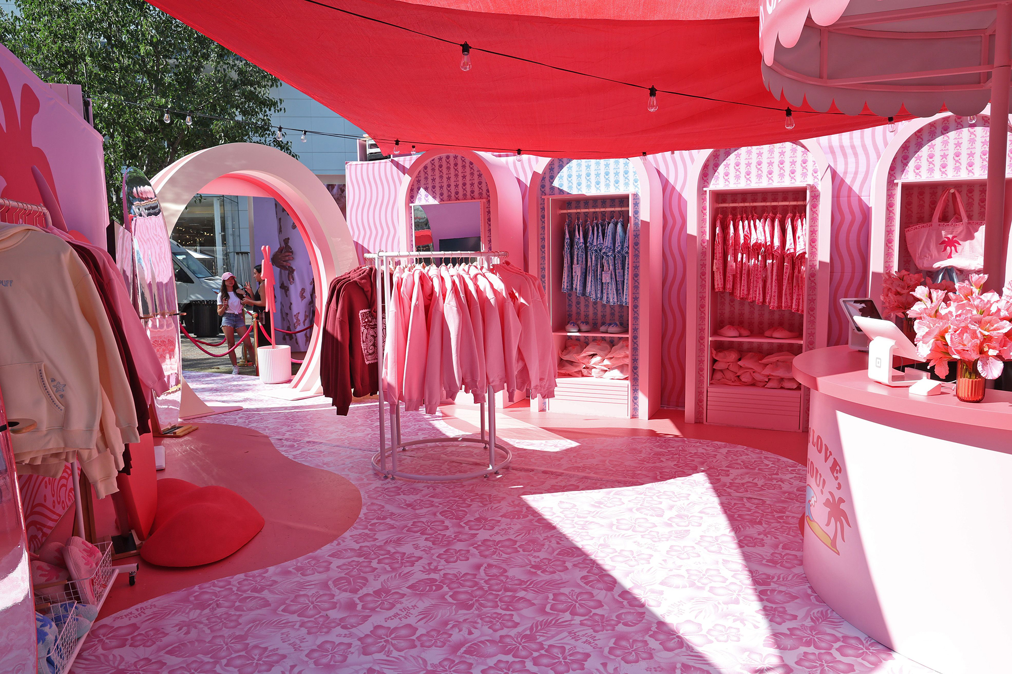 LOS ANGELES, CALIFORNIA - AUGUST 08: Pink Palm Puff VIP Pop-Up is seen during the Pink Palm Puff VIP Pop-Up Event at The Grove on August 08, 2025 in Los Angeles, California. (Photo by Phillip Faraone/Getty Images for Pink Palm Puff)