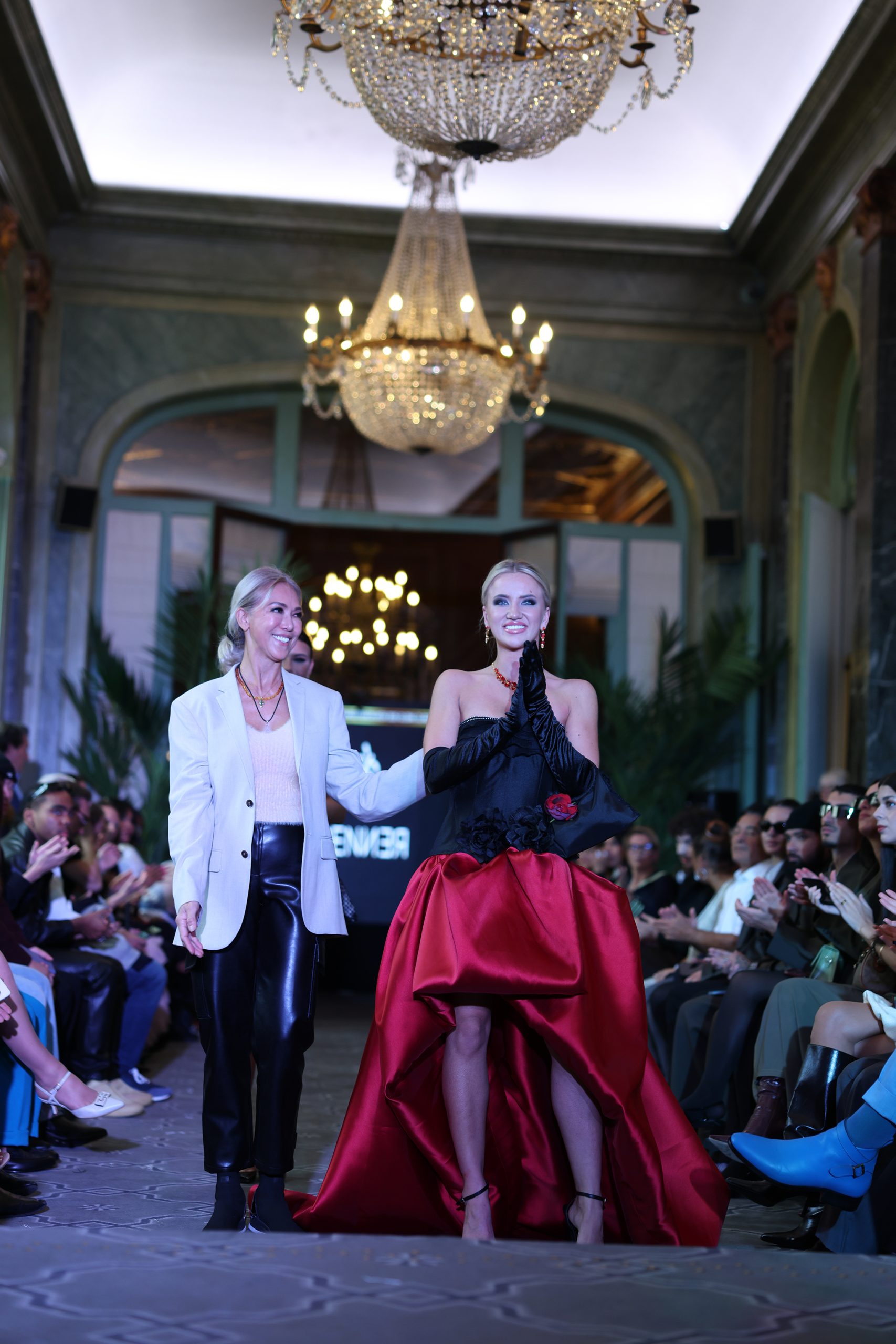 Paula Jane, Model from Ireland, wears a couture gown for Marjorie Renner on the Runway at Paris Fashion Week on October 5th at Global Glam Fashion Runway Show.