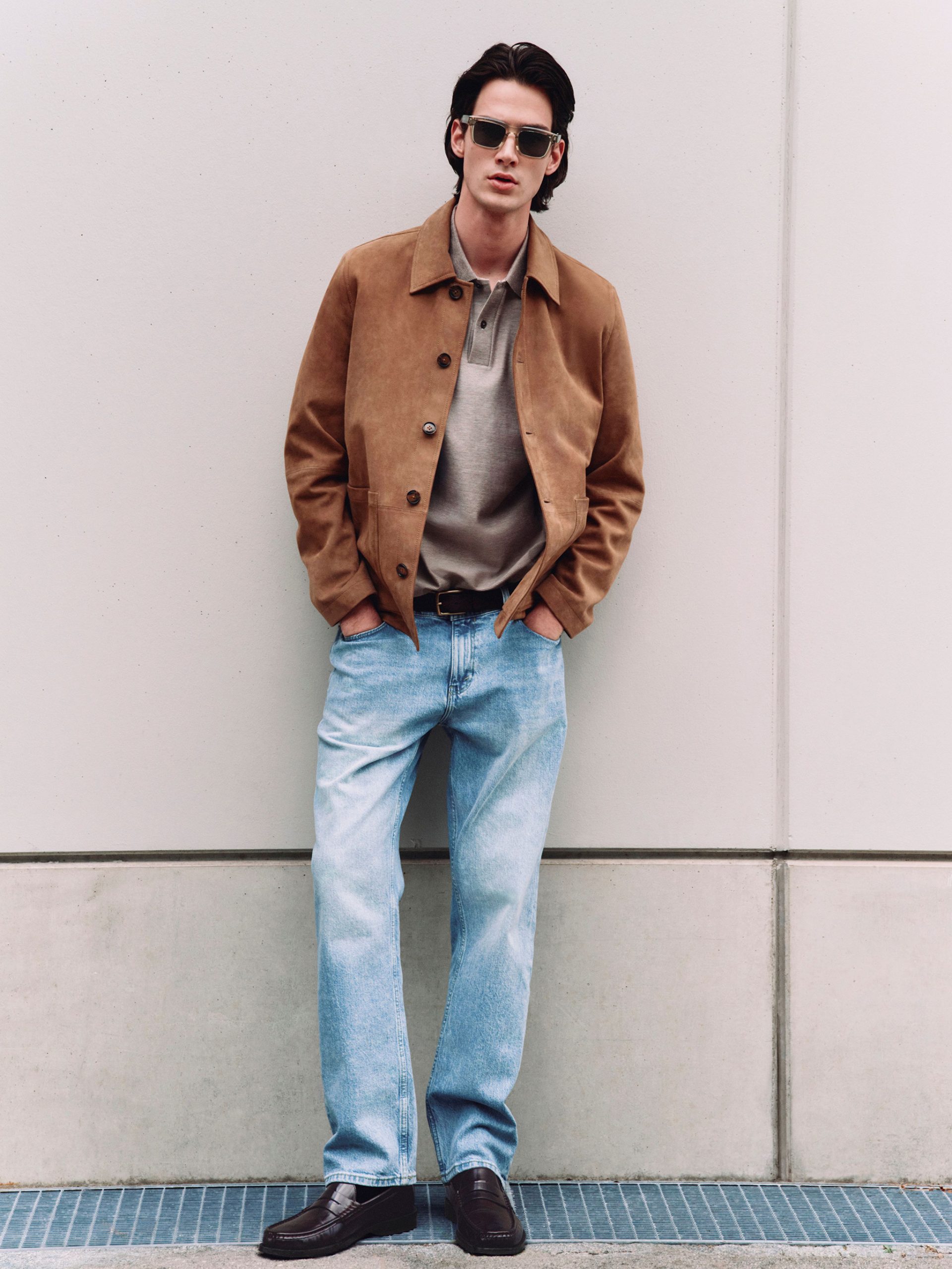 M&S - Straight Leg Jeans, Ultimate Polo Light, Suede Core Jacket, Belt and Sunglasses. Photo: Marks and Spencer.