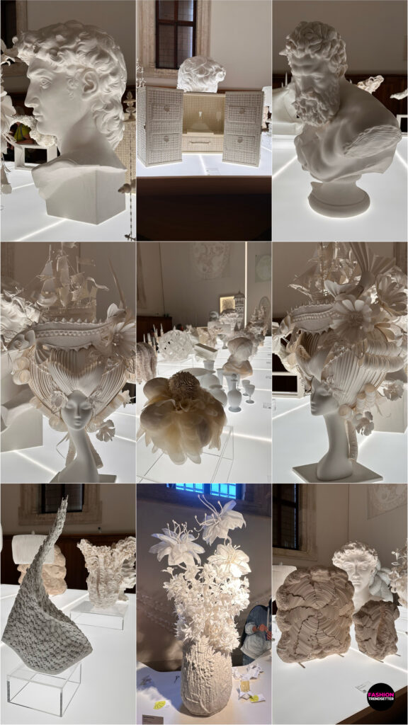 Homo Faber 2026: An Island of Light - A Feast of Light A Feast of Light explored the transformative power of light through the delicate interplay of translucency, material, and form. Within the magnificent Palladian Refectory, a vertical line of light divided the space, illuminating a curated collection of white objects and revealing the subtle qualities of their surfaces. Delicate paper cuttings were displayed above a lightbox table featuring sculptural works in porcelain, glass, textiles, paper, and other materials. United by a restrained monochromatic palette, these creations demonstrated how light could reveal intricate details, soften contours, and lend materials an almost ethereal presence. Behind the wall, an extraordinary reproduction of Paolo Veronese's The Wedding at Cana offered a striking artistic counterpoint, connecting the contemporary celebration of craftsmanship with the grandeur of Venetian art. Photos © 2026, Senay Gokcen for Fashion Trendsetter.