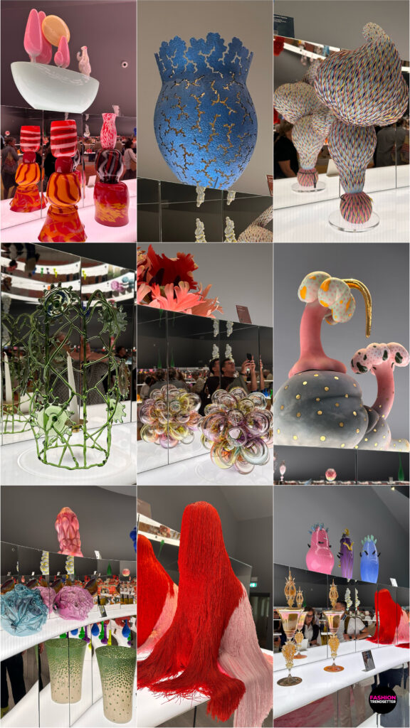 Homo Faber 2026: An Island of Light - A Rainbow of Forms A Rainbow of Forms, supported by JSW Foundation, celebrated the expressive power of color through an exuberant collection of objects crafted from plastic, enamel, resin, glass, and a wide range of other materials. Arranged on mirrored shelves and rotating bases beneath an expansive mirrored ceiling, the pieces created an immersive environment in which color, light, and reflection continually transformed the perception of form. The interplay of surfaces and perspectives lent the exhibition space a sense of movement and visual abundance, revealing the versatility of contemporary craftsmanship across diverse materials. Anchoring the installation was an exquisite rug designed by Es Devlin and inspired by Goethe's Theory of Colours, bringing an artistic and conceptual dimension to this vibrant exploration of colour, perception, and design. Photos © 2026, Senay Gokcen for Fashion Trendsetter.